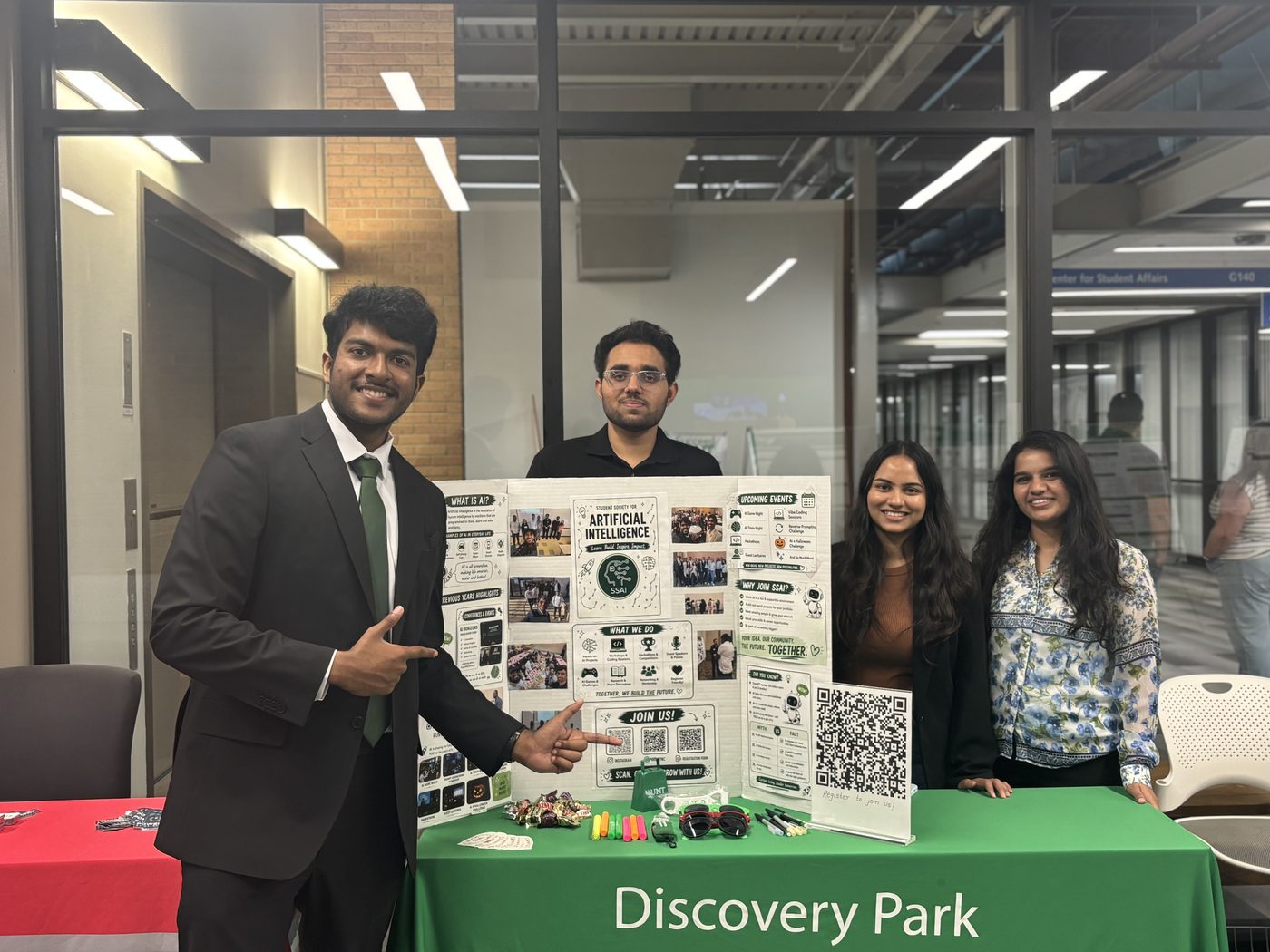 Samuel and the SSAI officers at the club recruitment table in Discovery Park